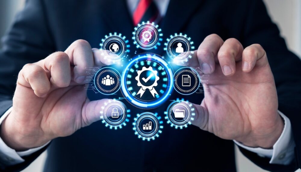 Business professional managing digital IT services with icons for security, users, data, and performance around a central quality badge.