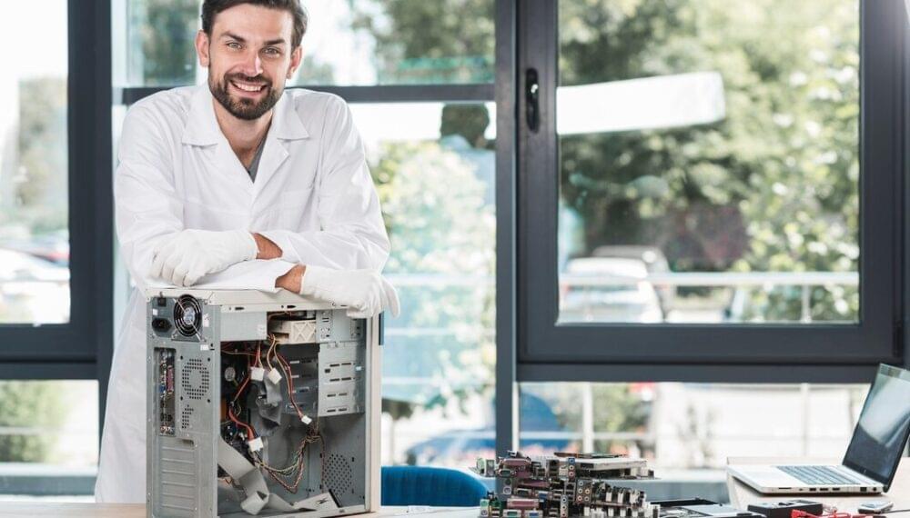 portrait-happy-male-technician-w